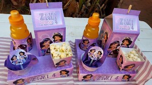 Our custom made Princess Jasmine and Alladin party supplies include personalised invitations, paper cups and plates, blowouts and more.