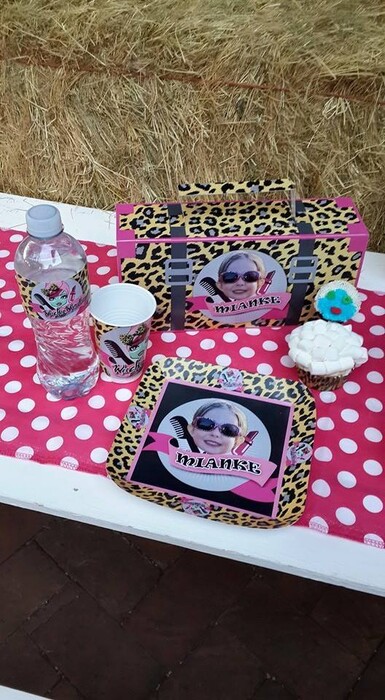 Our custom made party supplies include personalised invitations, paper cups and plates, blowouts and more.