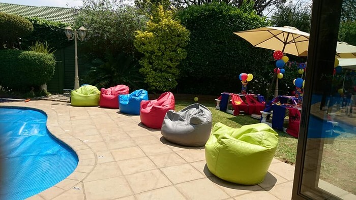 Multi coloured bean bags to rent for parties and functions.